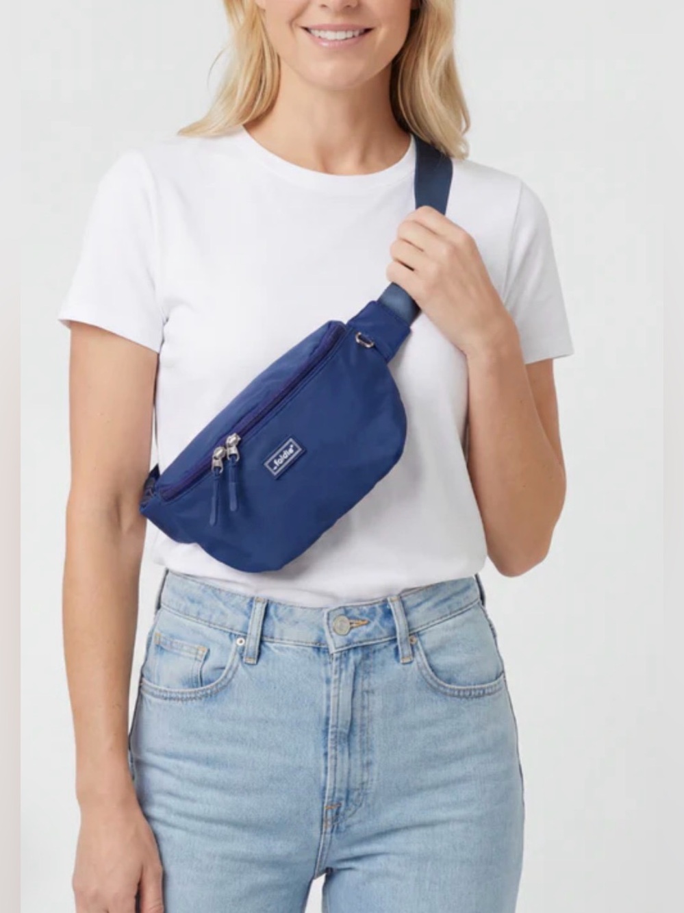 The Foldie Crossbody in navy blue